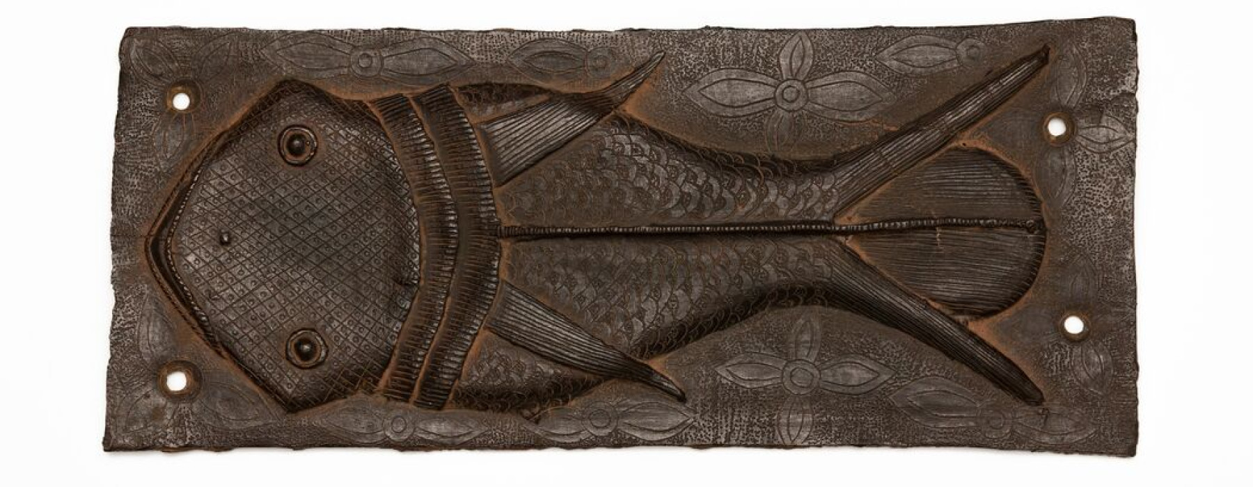 Ama O Ghe Ehen (Fish Plaque), 18th Century, Brass(bronze), 43 x 18 cm. Court of the Oba of Benin, Nigeria. Courtesy of the NCMM, on behalf of the Oba of Benin. Photograph by Martijn Schmidt.